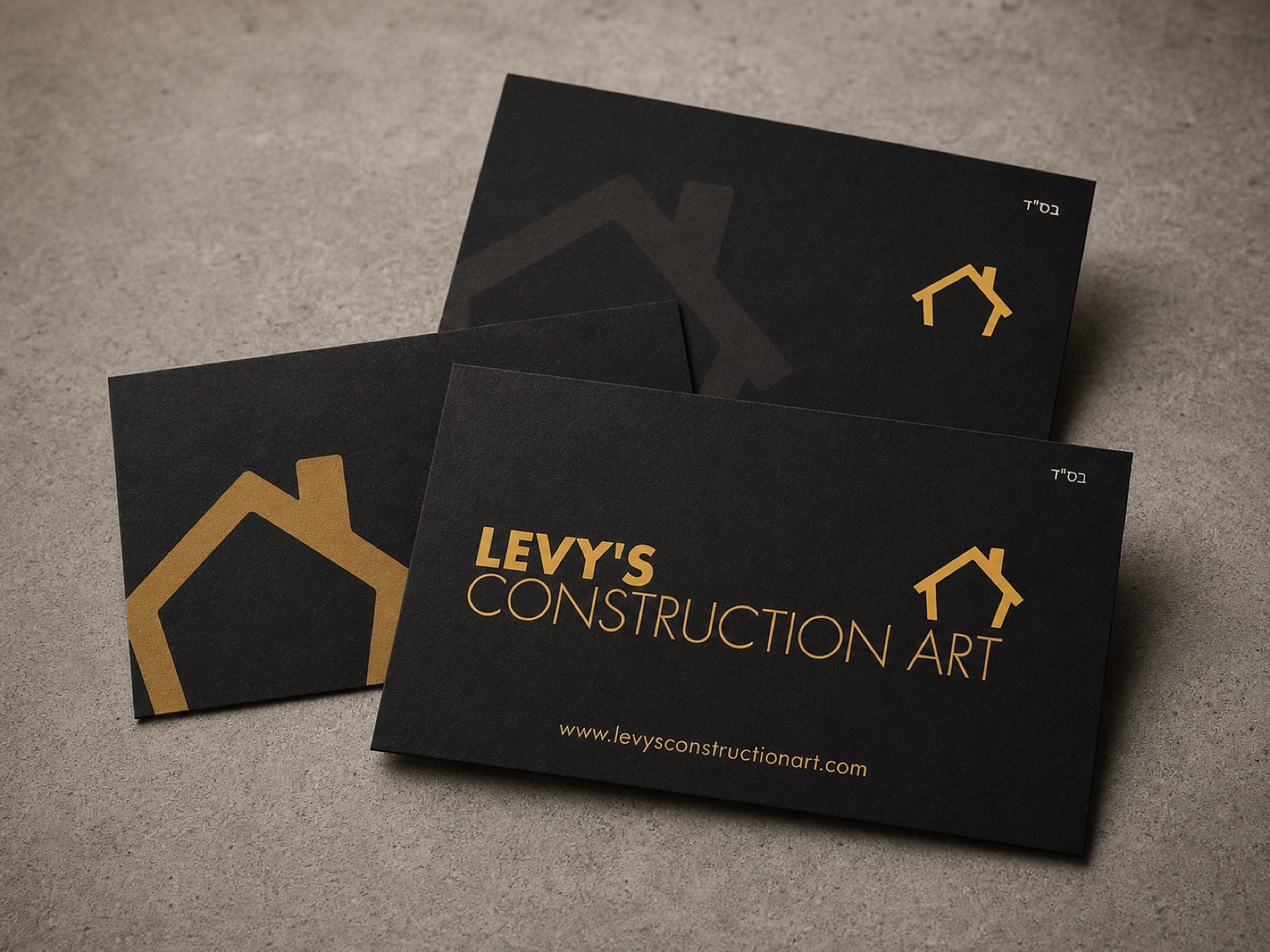 Envelopes and a card, laid out flat — the mailer side of the print system.